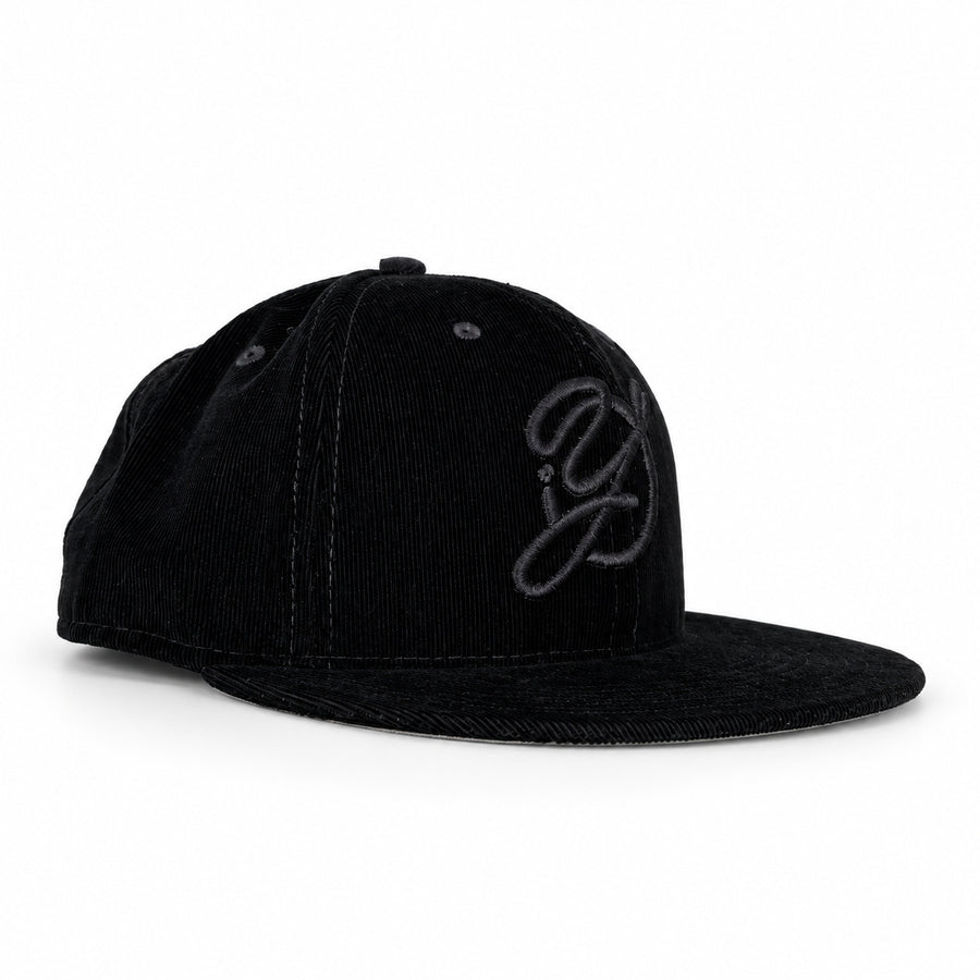 Black-on-black corduroy Yofi fitted hat, three quarter view
