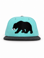 Baby blue CaliBear New Era fitted with black bear and white fish — front