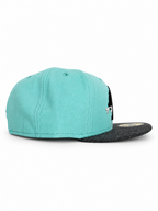 Baby blue CaliBear New Era fitted with black bear and white fish — side