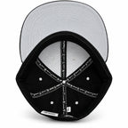 Black corduroy fitted Yofi hat with white embroidery, interior view