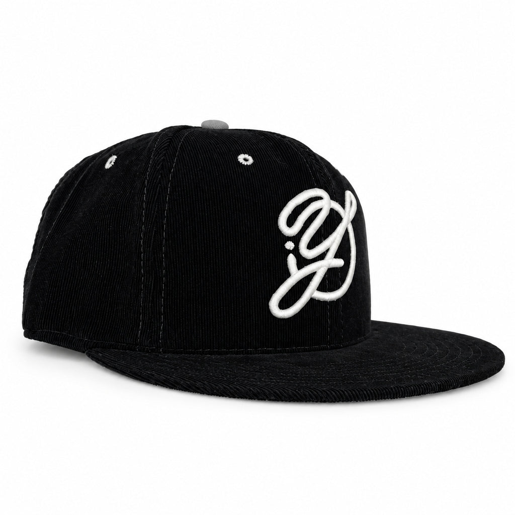 Black corduroy fitted Yofi hat with white embroidery, three quarter view
