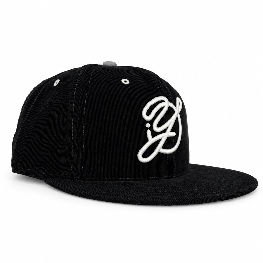 Black corduroy fitted Yofi hat with white embroidery, three quarter view
