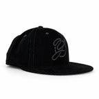 Black-on-black corduroy Yofi fitted hat, three quarter view